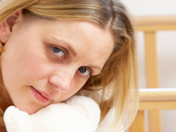 Wat zijn de oorzaken van een postnatale depressie?